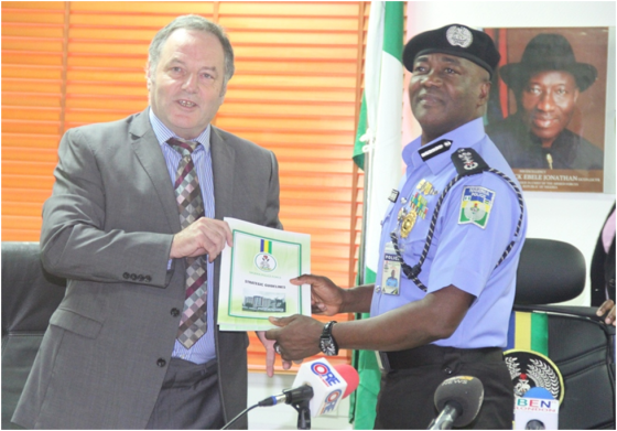 The presentation of the Strategic Guidelines on Counter Terrorism to IGP MD Abubakar by DFID Representative, Bob Arnot 